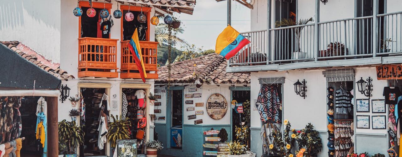 Vibrant colours, colonial‑style balconies, hanging plants, and festive street decorations in Cartagena.