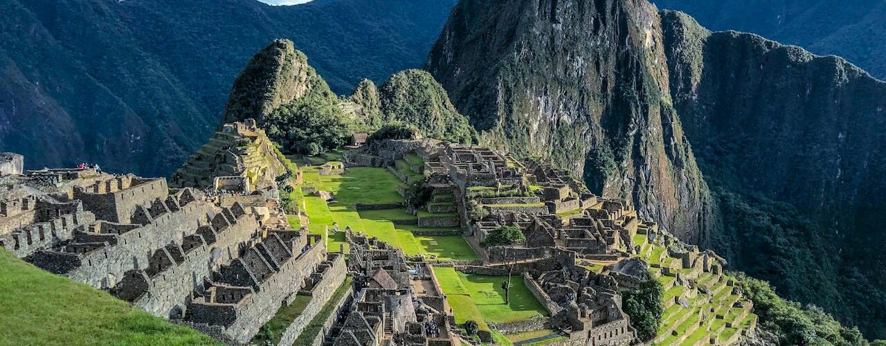 Machu Picchu rising through the clouds.